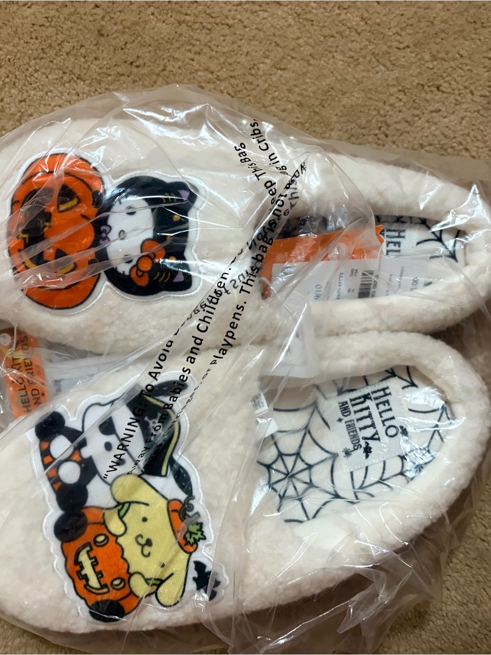 Hello Kitty Kids White Plush Slippers with Orange and Black Halloween Accents